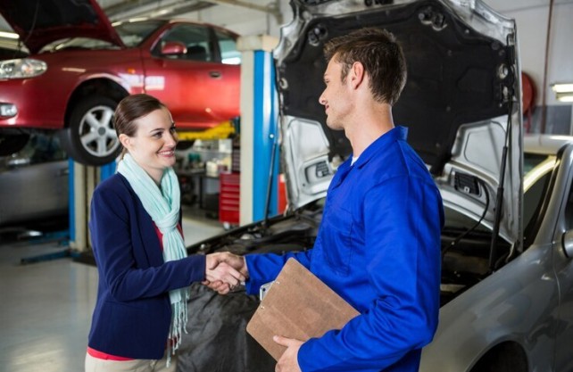Why Choose an Authorized Service Centre in Mumbai for Your Car Maintenance and Repairs Authorized Service Centre in Mumbai with trained technicians working on a car